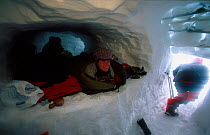 Inside a snow hole with two doors and six berths. Finse, Hardangervidda, Norway