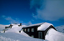 Mountain hut after snow storm. Finse, Hardangervidda, Norway