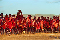 Maasai 'Emowuo-o-lkiteng ceremony, Kedong Valley, Rift valley, Kenya. Initiates listen to elder's speech. 1985