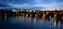 Charles Bridge and river at dusk with St Vitus Cathedral, Prague, Czech Republic