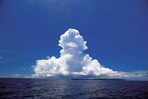 Y-1004 Cumulonimbus clouds in blue sky over sea surface