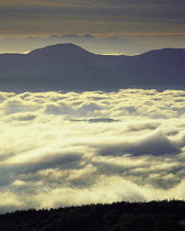 Y-9303 Looking down on clouds below mountain peaks, Yatsugatake, Nagano, Japan