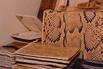 Python snakeskin products, handbags and wallets, for sale in duty free shop, Lagos airport, Nigeria. 2002