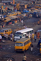 Buses and other vehicles in the Bidonville slums of Lagos, Nigeria. 2002