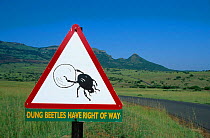 Dung beetle road crossing warning sign. Itala Game Reserve, South Africa