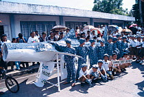 Children with Whale shark model made of bamboo and rice sack material for whale shark festival in Donsol, a small fishing village in the Philippines 2002