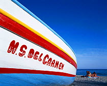 Colourful fishing boat on beach, Nerja, Costa del Sol, Spain