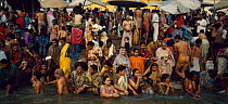 People bathing in religious rites in the Holy Ganges, Varansi / Benares, India