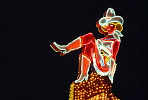 Fremont Street neon sign of cowgirl, Las Vegas, Nevada, USA