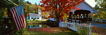 Church and Covered Bridge in autumn, Stark Village, New Hampshire, USA