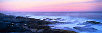 Panoramic view of rocky coastline at dusk, Maine, USA