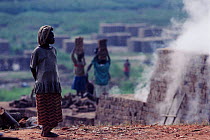 Rwandan women collecting bricks at brick kiln, Kinigi, Ruhengeri, Rwanda