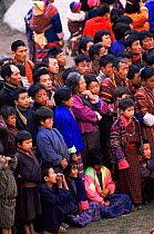 Crowds watching dance of the Black hats, Gom Kora Festival, Bhutan 2001