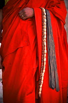 Buddhist monk, master of discipline, with beads of office, Gom Kora, eastern Bhutan 2001