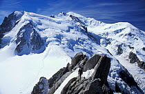 Looking towards the summit of Mont Blanc with climbers in foreground, Alps, France