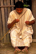 Machiguenga indian making fishing arrow, Lower Arubamba river, Amazonia, Peru