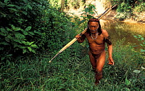 Yaminahua indian with bow and arrow, Boca mishagua river, Peru (first contacted in 1988)