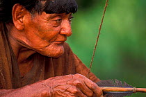 Machiguenga indian with bow & arrow, Timpia community, Lower Urubamba river, Amazonia, Peru