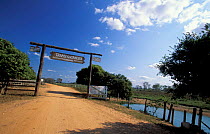 Entrance sign across road to the Pantanal, Brazil