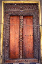 Ornate carved studded door. Stone Town, Zanzibar, Tanzania