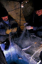 Inside fishing tent over ice hole on Lake Baikal, Siberia, Russia