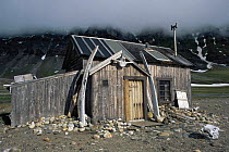 Trapper's cabin (Camp bell), decorated with whale bones, located on edge of Van Mijenfiorden, Svalbard, Norway