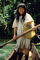 Maya indian boy in boat, Lacandon rainforest, Chiapas, Mexico