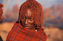 Masai warrior, Eunoto ceremony, Mara, Kenya, hair rubbed with ochre,