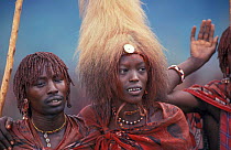 Masai warrior at ceremony, one wear a lions mane headress, Eunoto ceremony. Kenya