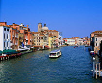 Looking east along the Grand canal with water buses, Venice, Italy