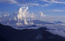 Clouds over mountains and rainforest canopy, Taiwan, view south from Hohuan Shan