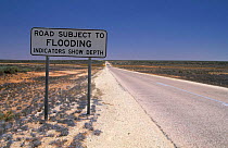 Flood warning sign on outback, Western Australia