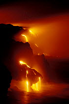 Lava flows off Lae'apuki Bench into sea during continuing eruption from Pu'u O'o, Kilauea Volcano, Hawaii Volanoes NP, Big Island of Hawaii 2000  (Non-ex).