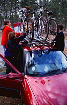 Bicycles on roof of car, Moors Valley Country Park, Dorset, England