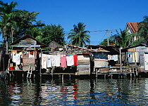 Wooden houses beside Belize city canal, Belize, Central America