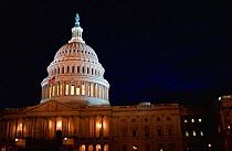 United States Capitol building floodlit at night, Washington DC, USA