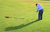 Person playing golf, Edzell, Angus, Scotland