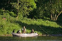 People in boat fishing salmon, Ballathie beat, River Tay, Ballathie, Perthshire, Scotland