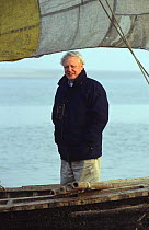 David Attenborough on boat on River Ganges, Bihar, India, 2002, on location for "Life of Mammals"