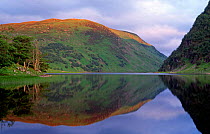 Moorland reflected in Loch Killin, Highland, Scotland.