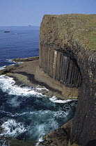 Basalt columns and entrance to boat cave near Fingal's cave, Staffa Island, Inner Hebrides, Scotland