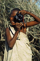 Maasai boy posing with camera, Kedong valley, Mt Longonot Rift Valley, Kenya