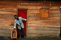 Man outside roadside bar, Djomba, Zaire