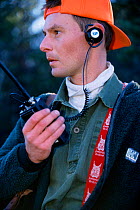 Hunter using radio transmission, Sweden.