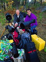 Staffan Widstrand and Magnus Elander with all their photographic equipment, Sweden.