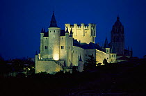 El Alcazar castle floodlit at night, XII- XVI century, Segovia, Spain