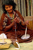 Machiguenga Indian woman spinning cotton, Timpia Community, Amazonia, Peru Lower