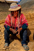 Quechua indian, unmarried men wear beaded hats, near Cusco, Andes, Peru