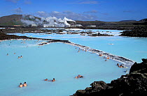Tourists bathing in Blue Lagoon 42 degrees C, Krisuvik, Iceland