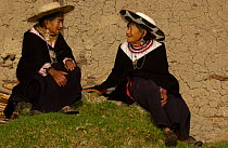 Two Saraguro indian women in traditional dress, Andes, Ecuador